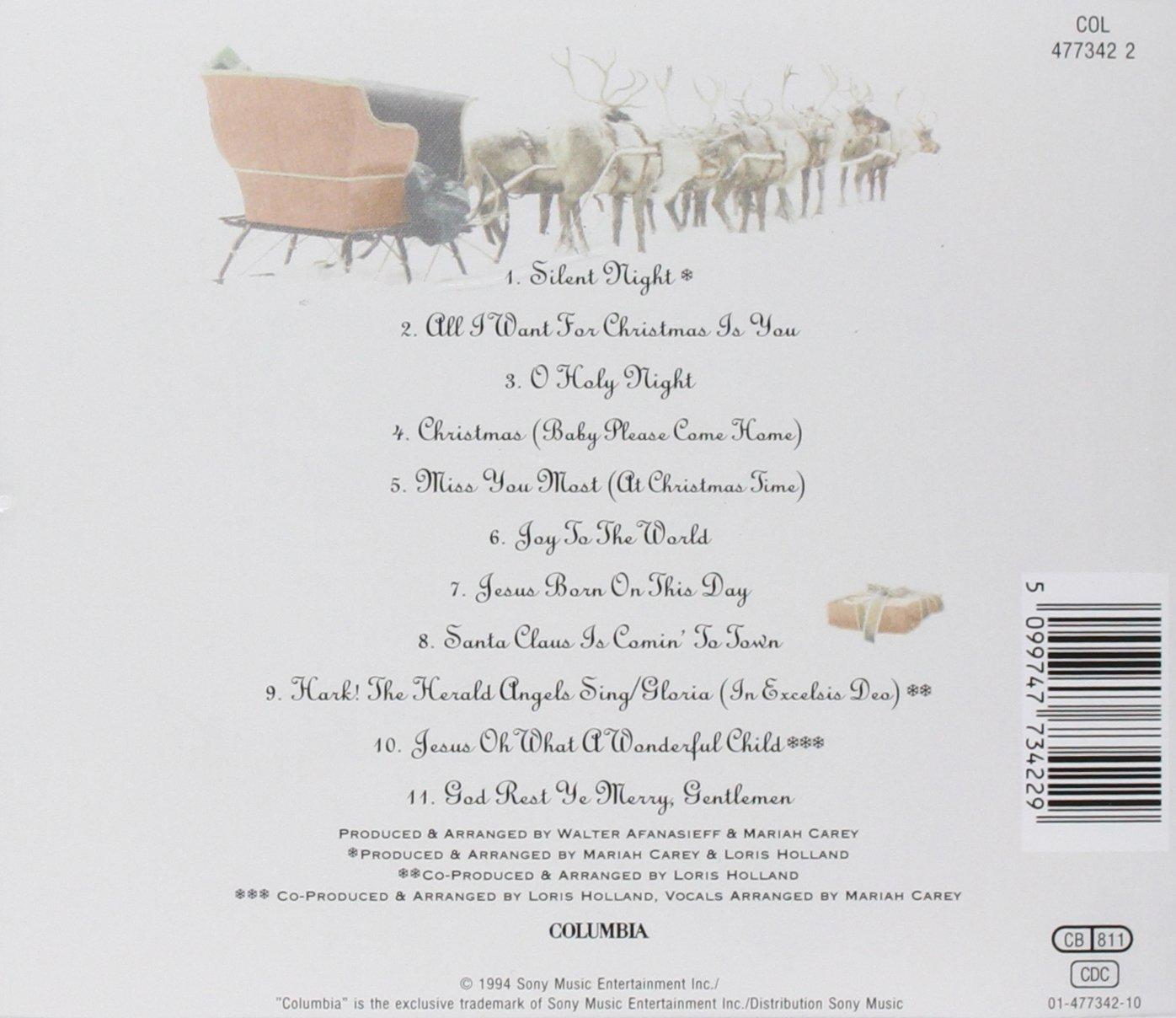 CD-borító téli jelenettel, szánnal és rénszarvasokkal, valamint karácsonyi dalok listájával.