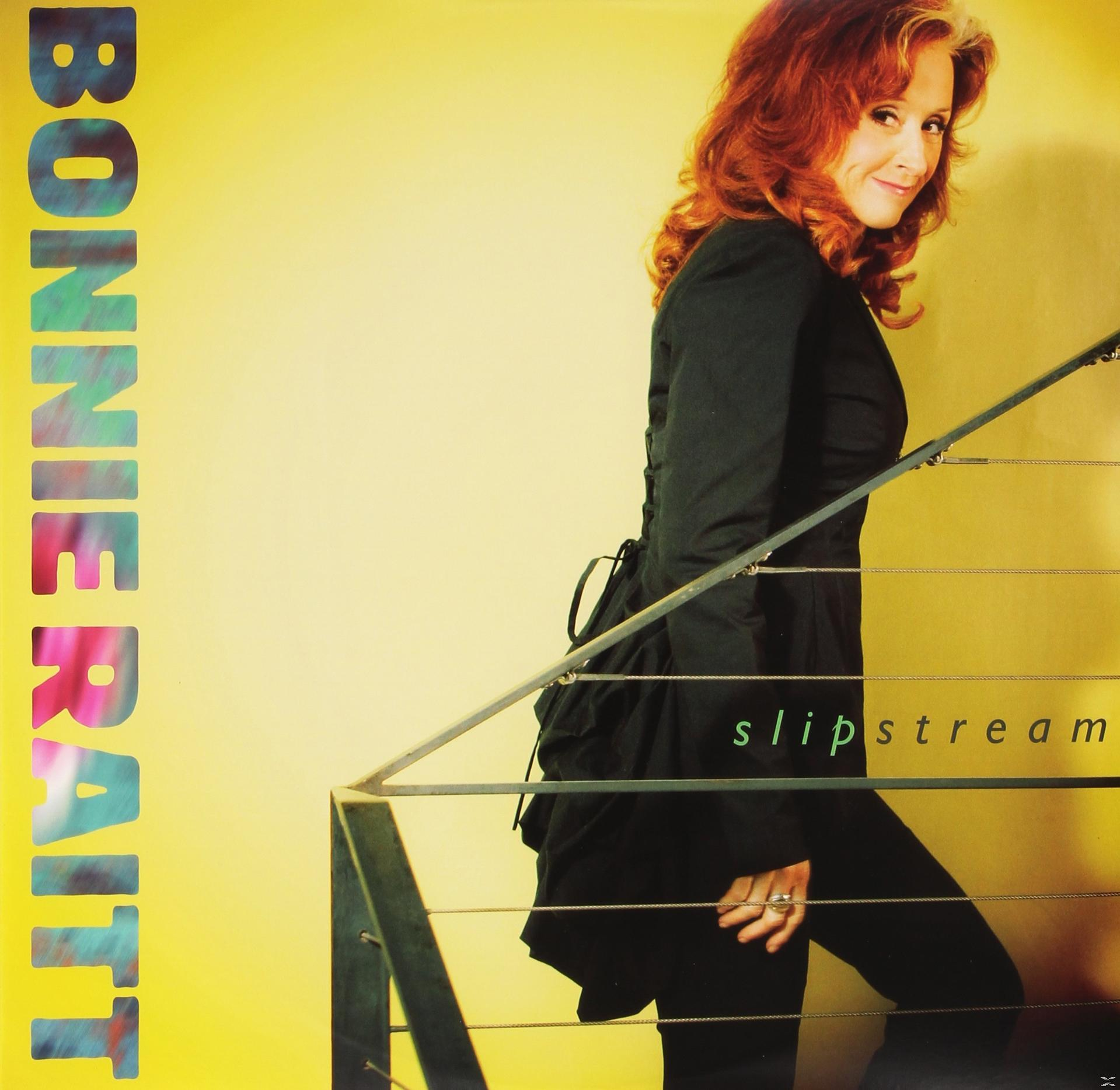 Albumcover von Bonnie Raitt, die eine Treppe hinaufgeht, mit dem Albumtitel Slipstream.