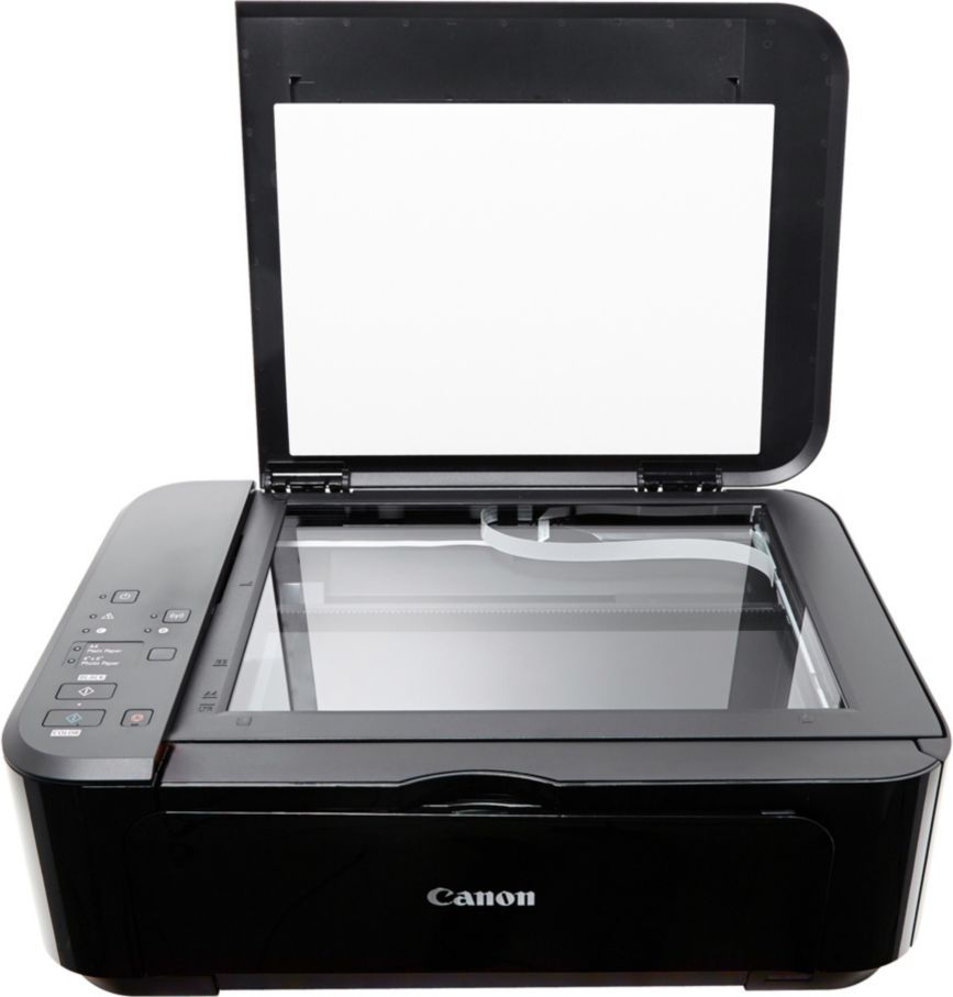 Imprimante Canon noire avec un couvercle blanc ouvert. Elle est placée sur un fond blanc.