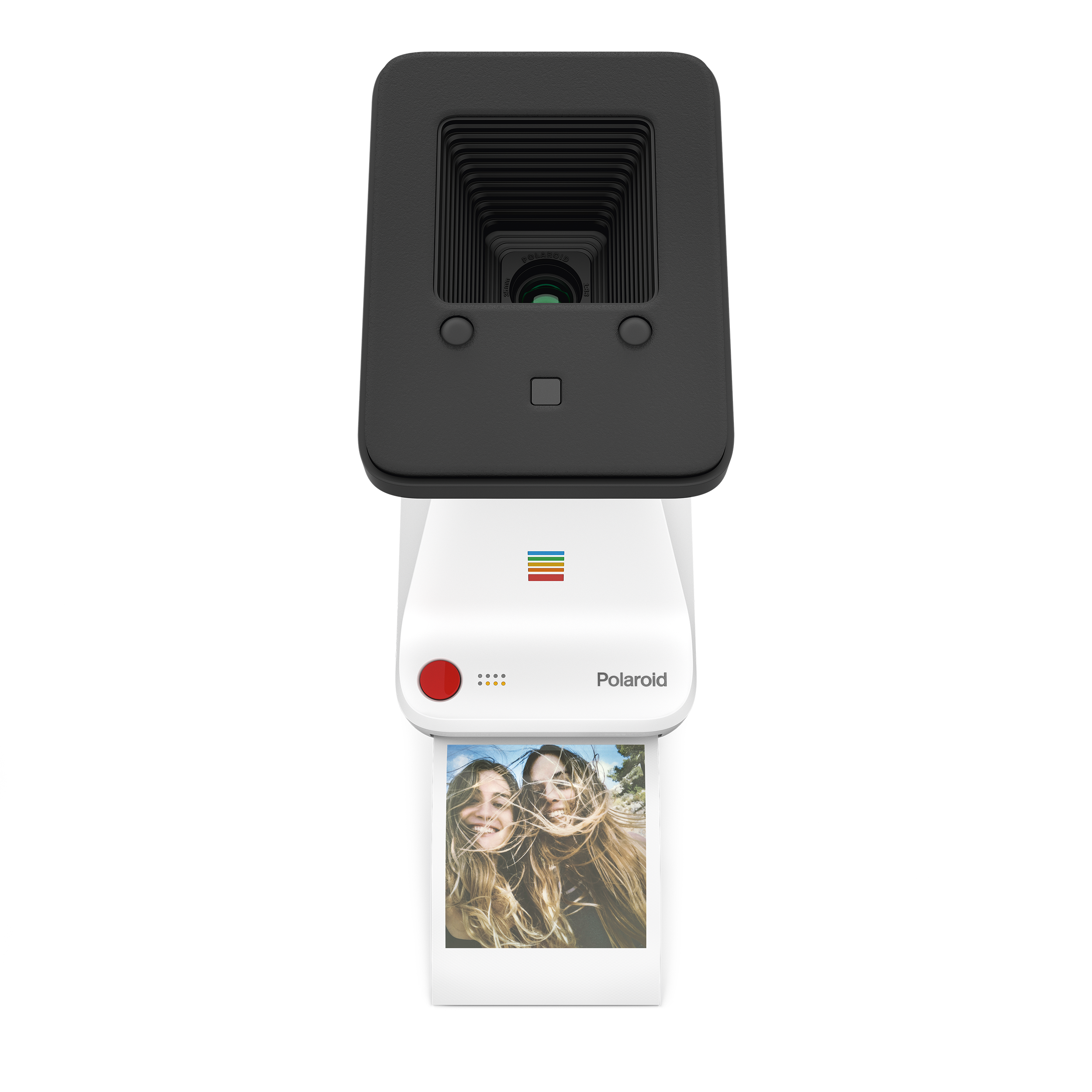 Eine weiße Polaroid-Kamera mit einem Foto von zwei lächelnden Frauen, schwarzer Hintergrund.