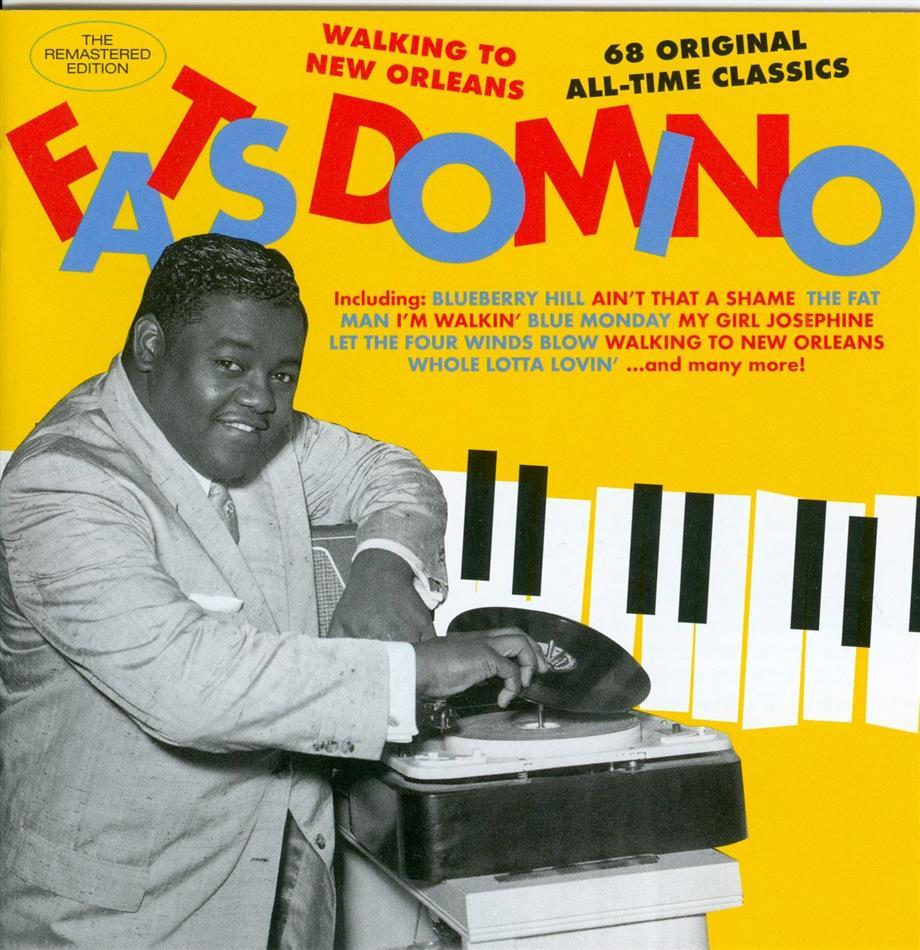 Album borító Fats Domino-val, mosolyogva, egy lemezjátszó mellett. Világos sárga háttér. Szöveg piros és kék színben.