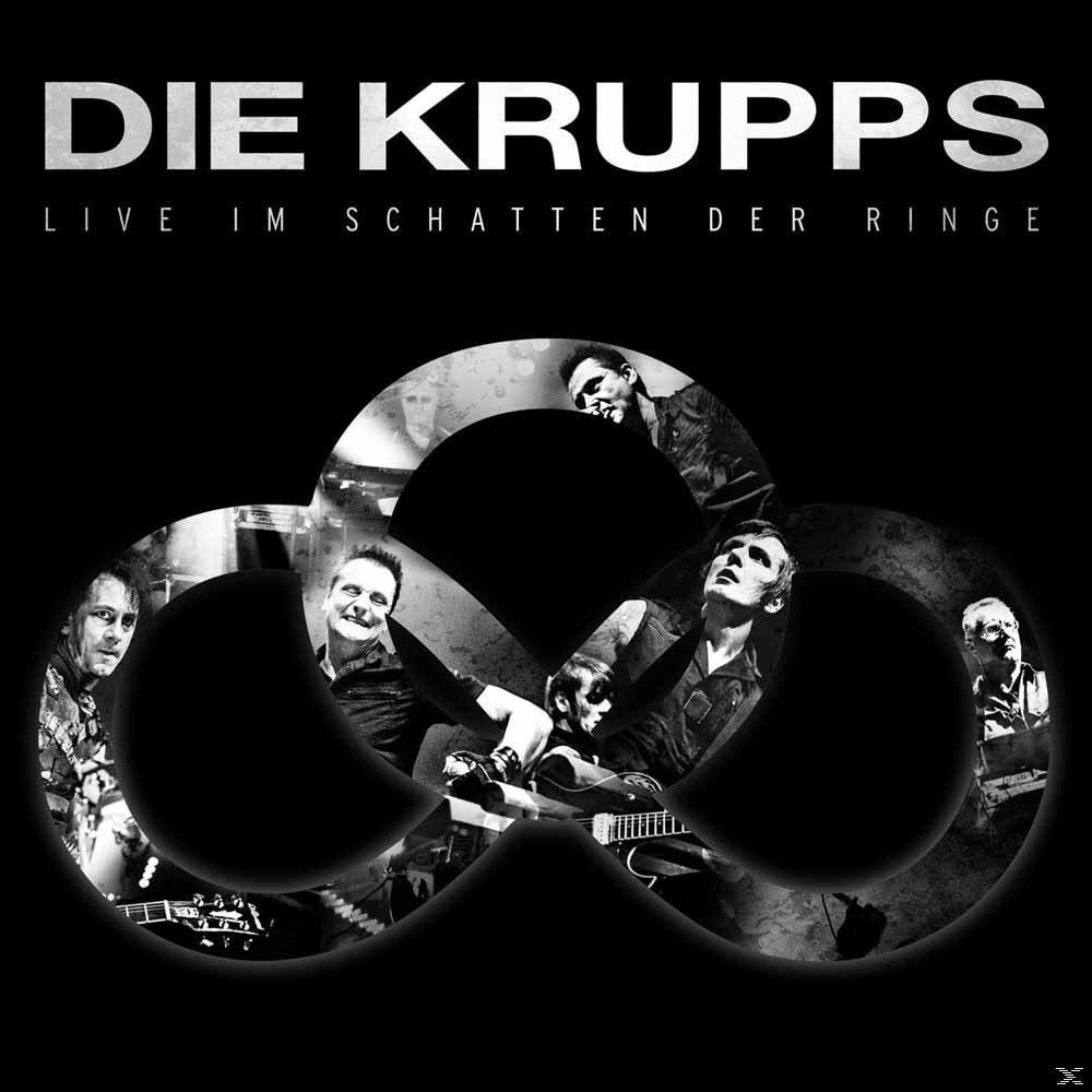 Schwarz-Weiß-Albumcover. Figuren in einem Kreis, Bandname oben.