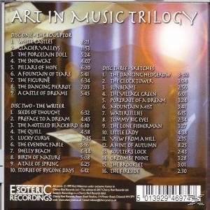 CD-Cover mit Titelliste von 'Art in Music Trilogy'. Text in Weiß, unscharfer Hintergrund.