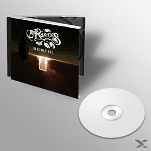 CD-Hülle mit CD darin und daneben. Das Cover hat den Titel 'Dark Matters'.