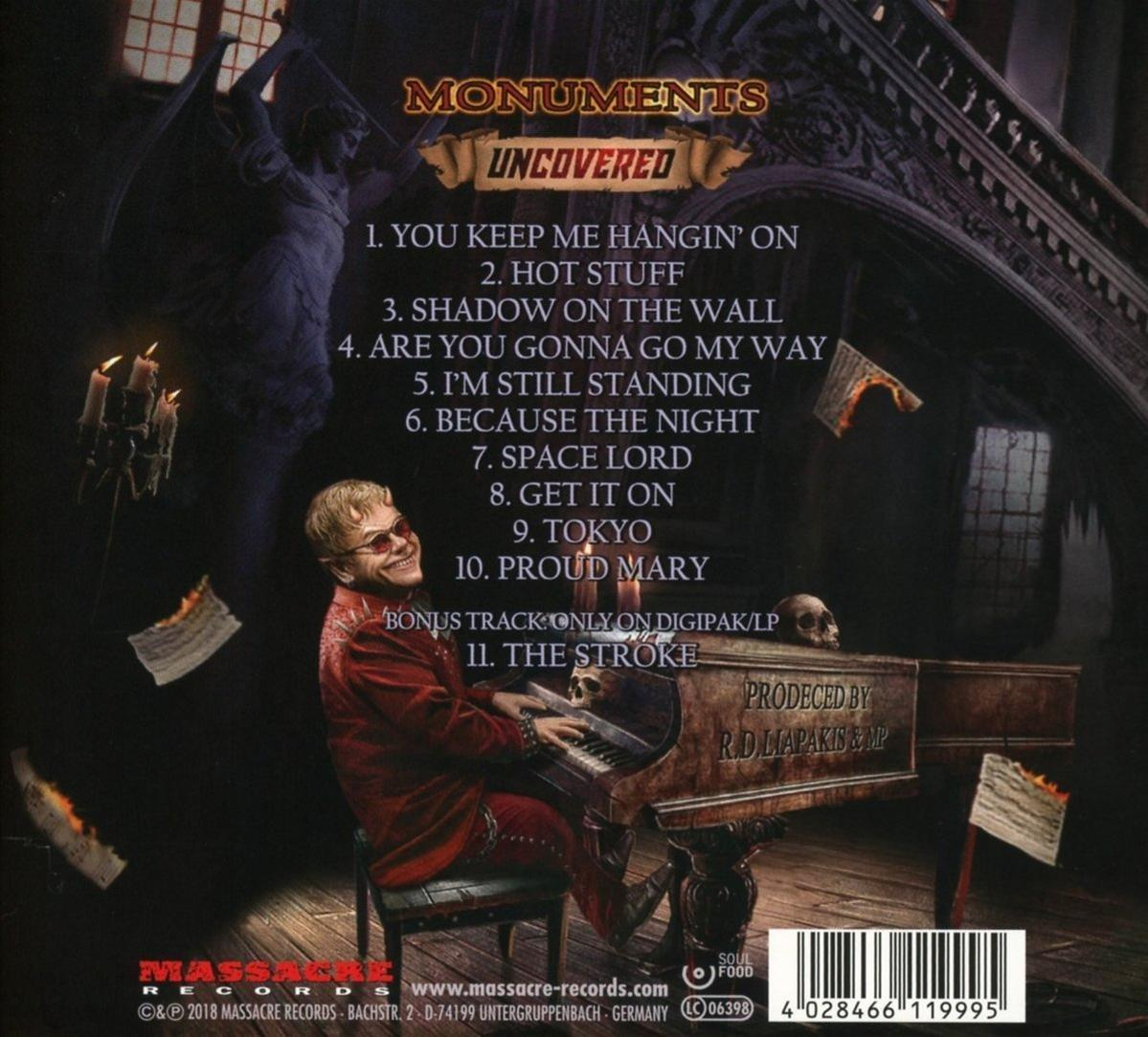 Albumhoes met Elton John aan een piano. Tekst geeft songtitels weer. Achtergrond bevat een standbeeld, kaarsen en een schedel.