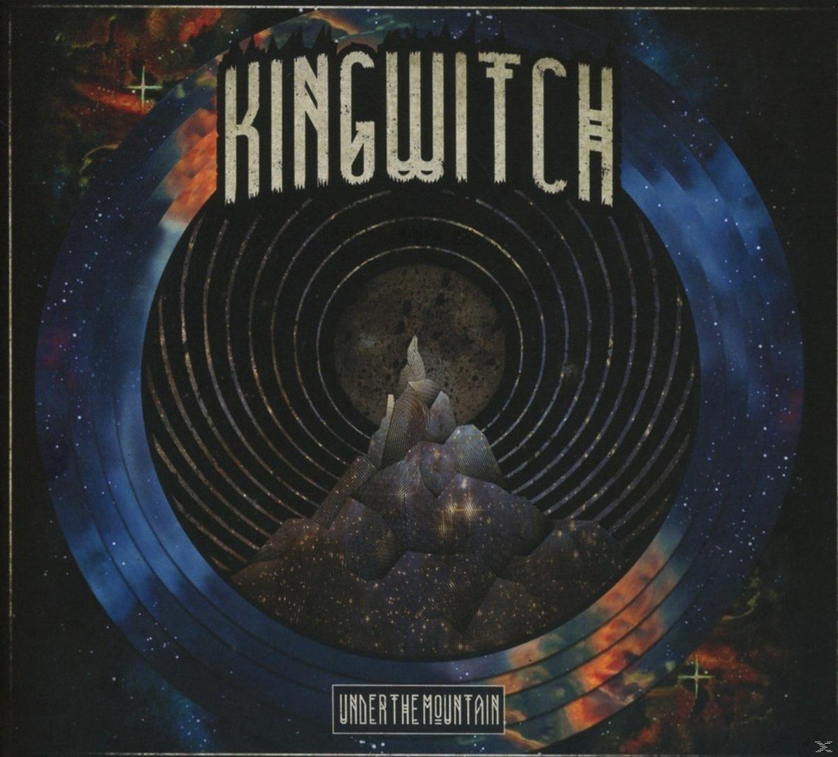 King Witch Albumcover: eine Berglandschaft in einer Schallplatte mit Weltraumhintergrund.