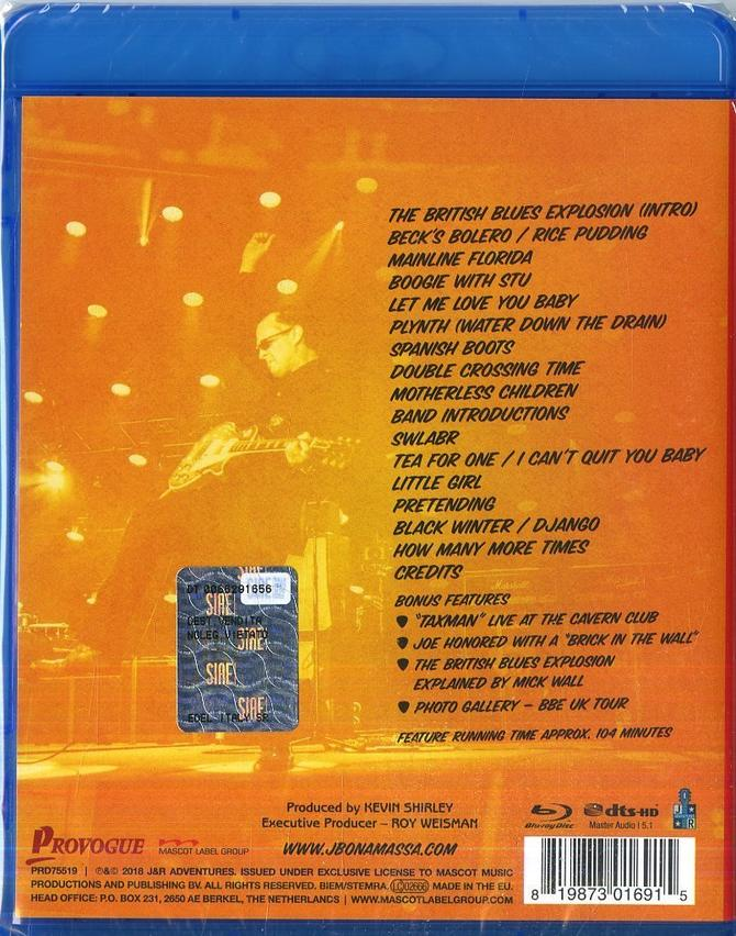 Blu-ray-Hülle, Rückseite mit Titelliste und Bild eines Gebäudes. Blau und gelb.