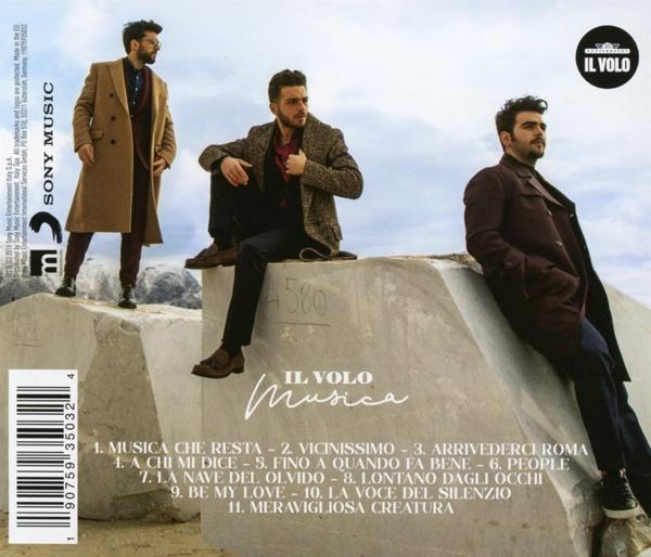 Albumcover mit drei posierenden Männern, Albumtitel und Titelliste.