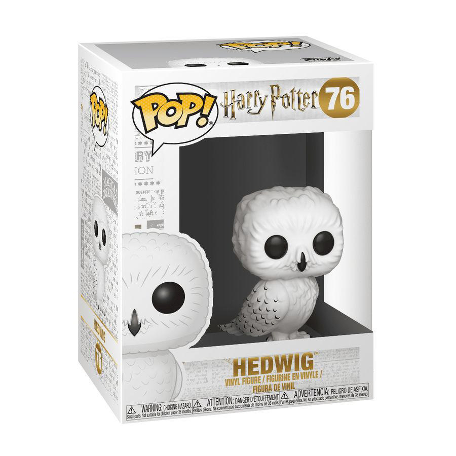 Weiße Eulenfigur in einer Box. Mit dem Namen 'Hedwig' und 'Harry Potter' Branding.