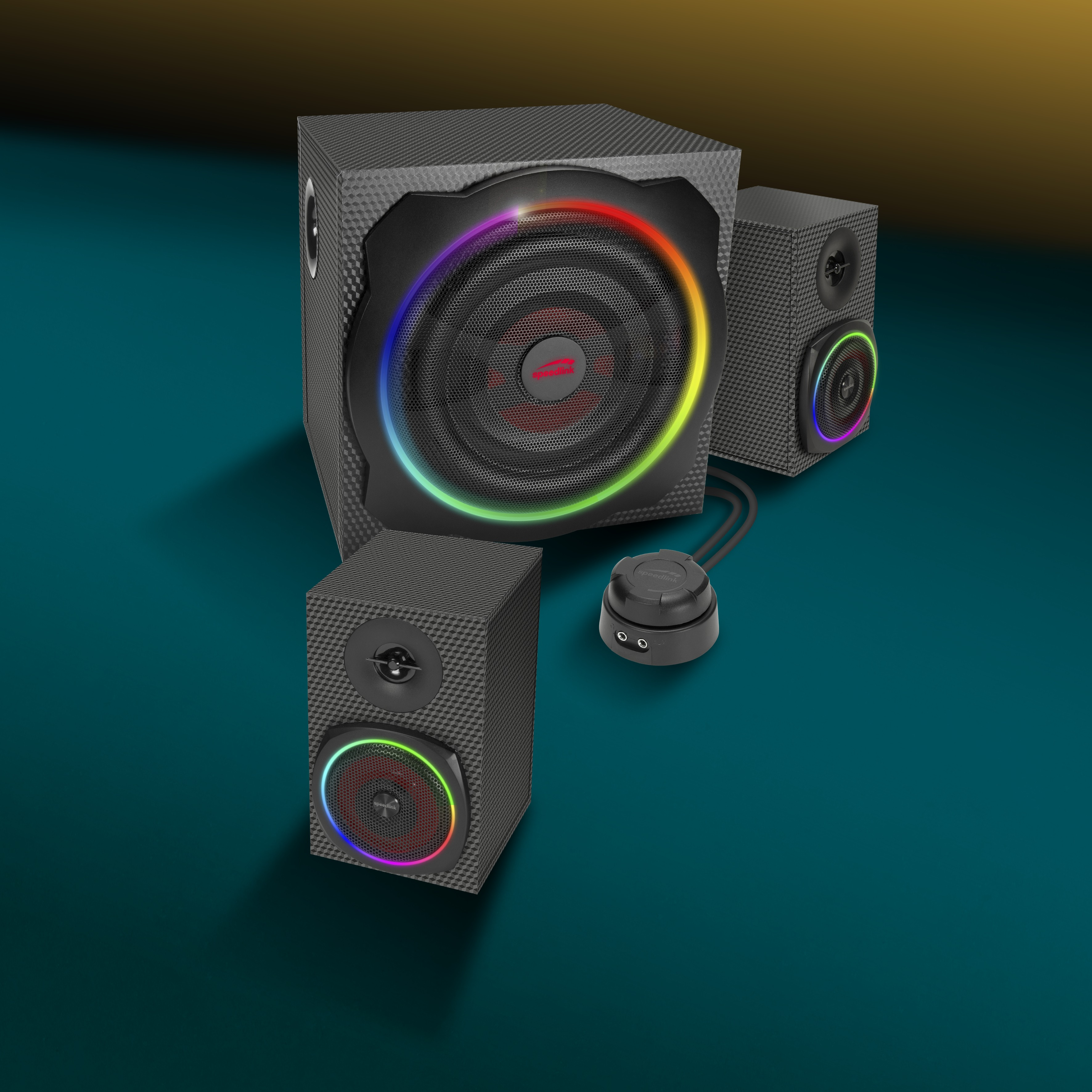Schwarzes Surround-Sound-System mit bunten Lichtern auf türkisfarbener Oberfläche.