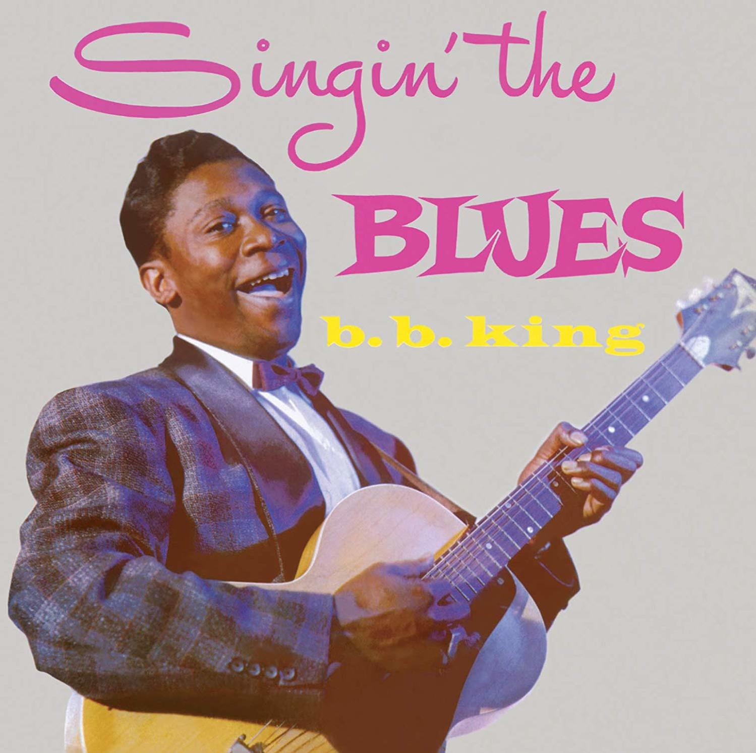 Album borító: B.B. King énekel és gitározik. Rózsaszín szöveg: Singin' the Blues. Szürke háttér.