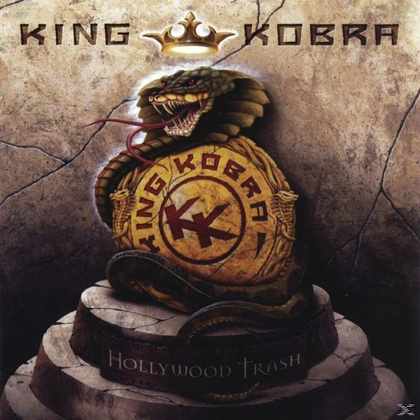 King Kobra album borítója, egy kígyó, amely egy kincsesláda köré tekeredik, felette koronával.