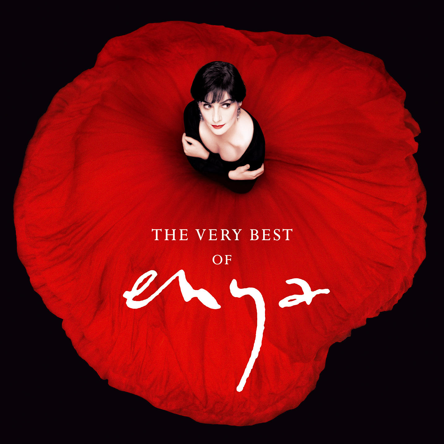 Pochette d'album d'Enya, avec elle en robe noire, dans une forme de fleur rouge.