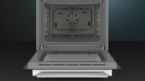 An open oven with a glass door, showing the interior and a fan. The door is open.