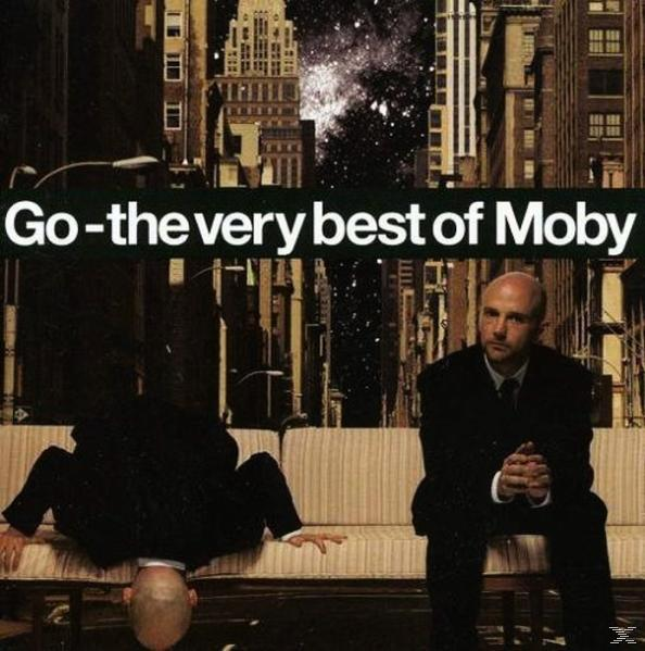 A Go-the very best of Moby albumborítója. Két öltönyös férfi, az egyik fejjel lefelé, városi háttérrel.