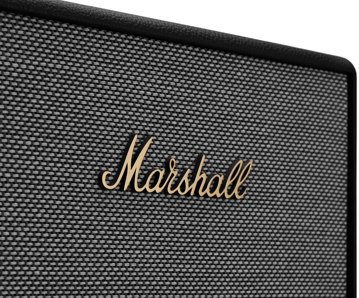Gros plan sur le haut-parleur Marshall avec le logo Marshall doré.