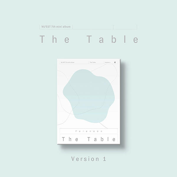 Albumhoes met 'The Table' en lichtblauw design.