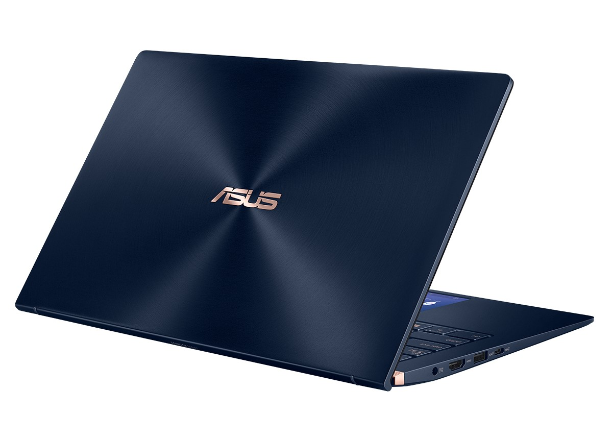 Laptop azul oscuro con el logotipo ASUS en oro rosa en la parte posterior.
