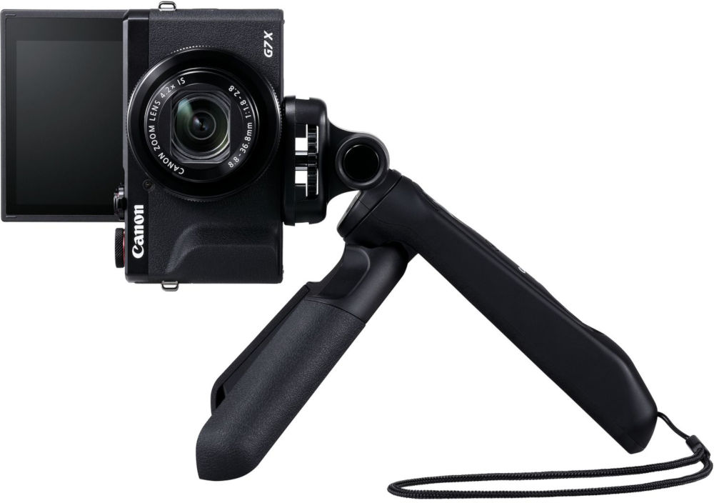 Een Canon camera op een statief. Het camerascherm is naar de kijker gericht.