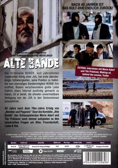 Filmposter. Ein Mann hinter Gittern steht im Vordergrund. Andere Leute sind im Hintergrund.