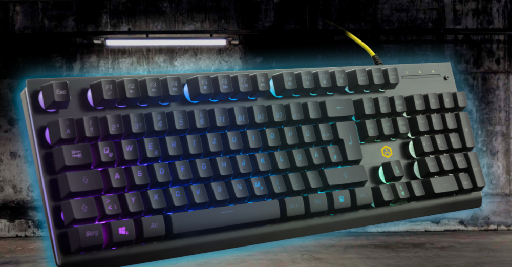 A black mechanical keyboard with backlit keys, a yellow cable, and a concrete wall background.