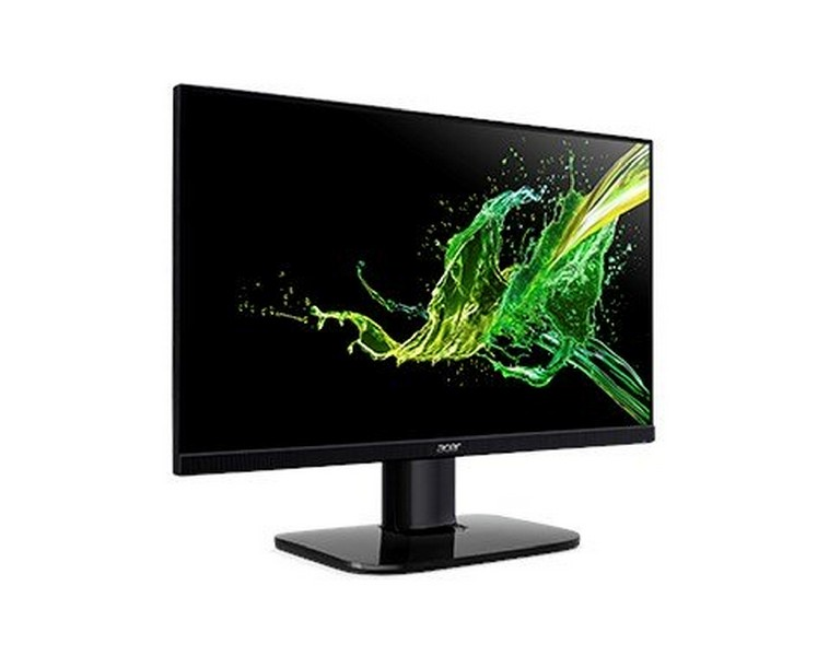 Un monitor negro con una base negra muestra una salpicadura de pintura verde y amarilla.
