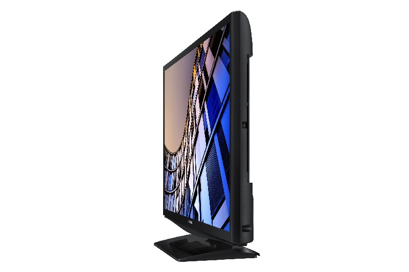 Un monitor de TV negro. Está en ángulo para mostrar la vista lateral. La pantalla muestra una imagen colorida.