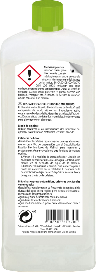 Parte trasera de una botella con texto sobre un líquido descalcificador y símbolos de advertencia.