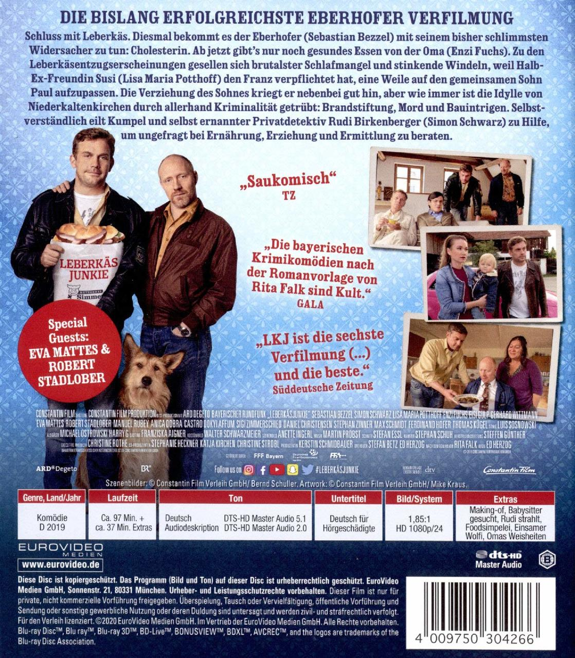 Rückseite einer DVD-Hülle mit Schauspielern und einem Hund. Text auf Deutsch, mit Familienfoto.