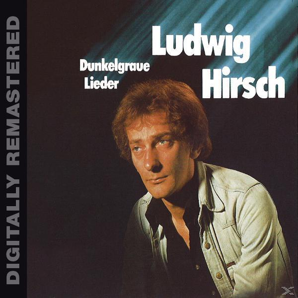 Albumcover mit Sänger Ludwig Hirsch, schwarzem Hemd, Jeansjacke. Dunkler Hintergrund.
