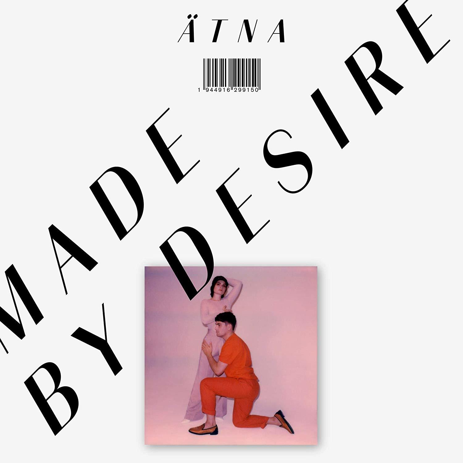 Albumcover mit zwei Personen, Text lautet 'MADE BY DESIRE'.