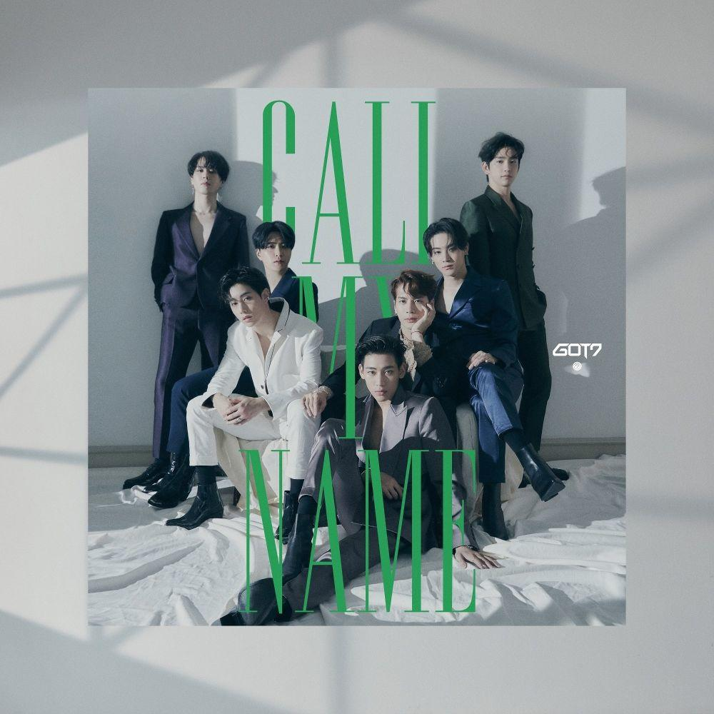 GOT7 groepsfoto in pakken. Groene tekst 'CALL MY NAME' op een witte achtergrond.