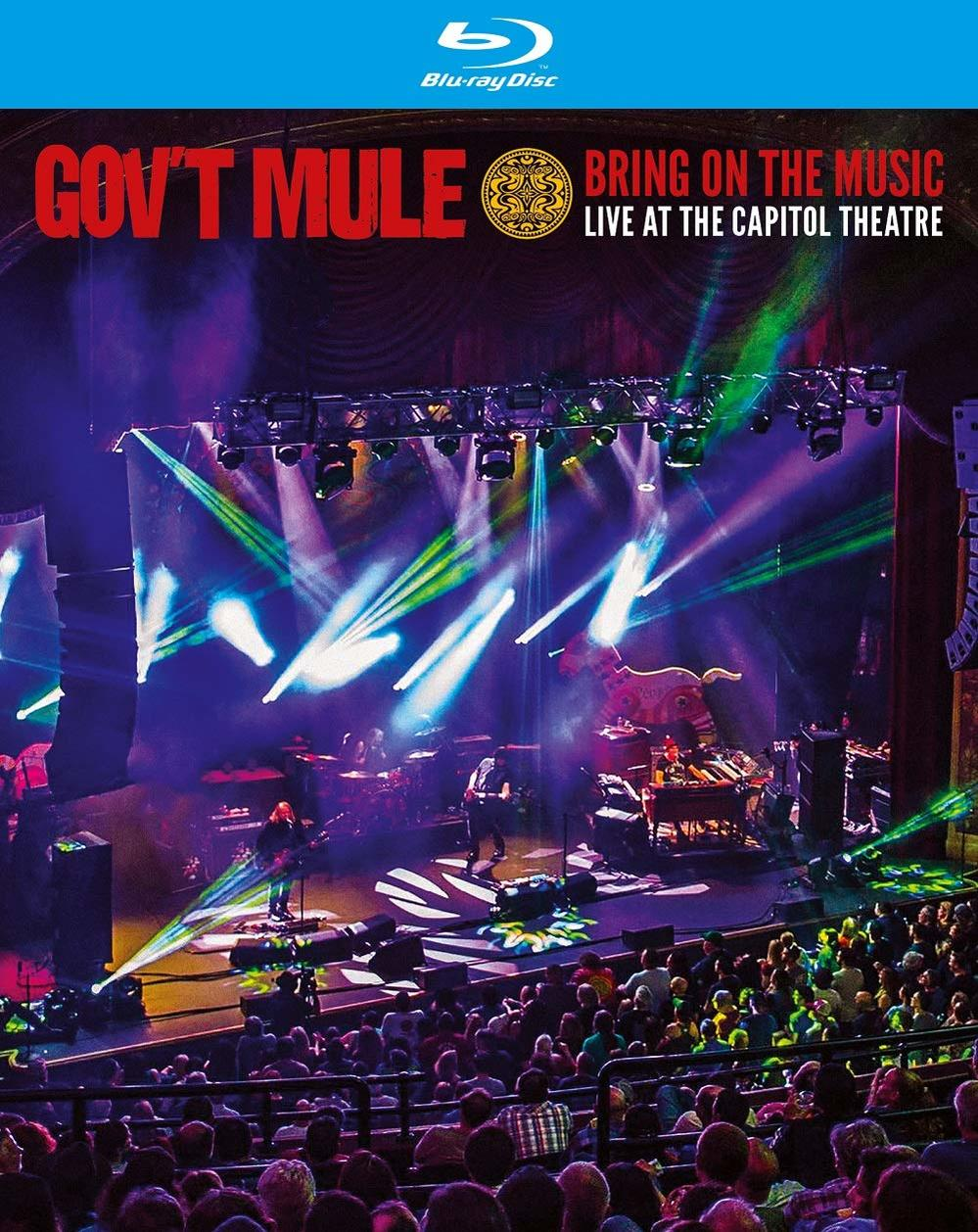Blu-ray-Cover: Gov't Mule live auf der Bühne mit hellem Licht und Publikum. Text: 'Bring on the Music'.