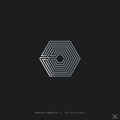 Album borítója ezüst geometriai logóval fekete háttéren. Szöveg alul.