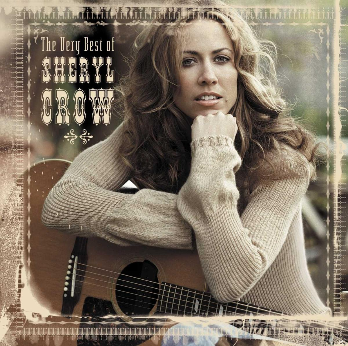 Album borító: Nő gitárral, 'The Very Best of Sheryl Crow' felirattal.