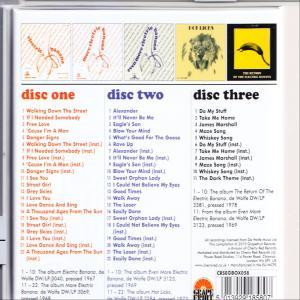 CD mit drei Discs. Jede Disc hat ein anderes Cover-Design und Titellisten.