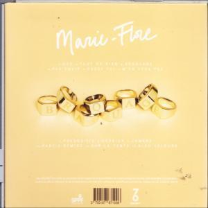 Pochette d'album avec le texte 'Marie-Flore' et des bagues en or épelant des mots.