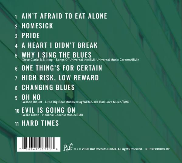 Rückseite einer CD mit Titelliste: Ain't Afraid To Eat Alone, Pride, Homesick und andere Songs.