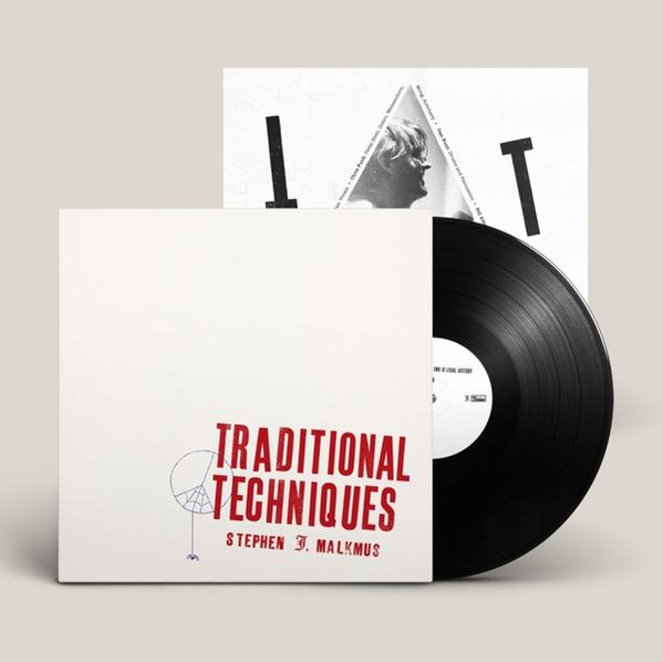 Albumcover: Eine Schallplatte und ein Cover mit weißem Hintergrund. Roter Text sagt Traditional Techniques.