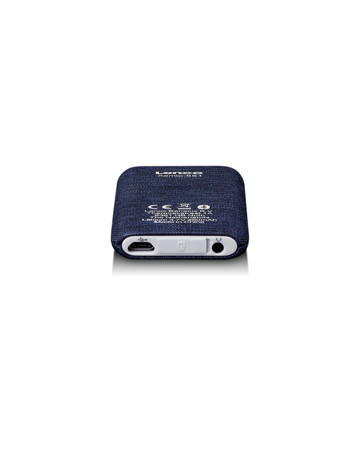 A small, dark blue, fabric-covered device, with a USB and headphone jack.