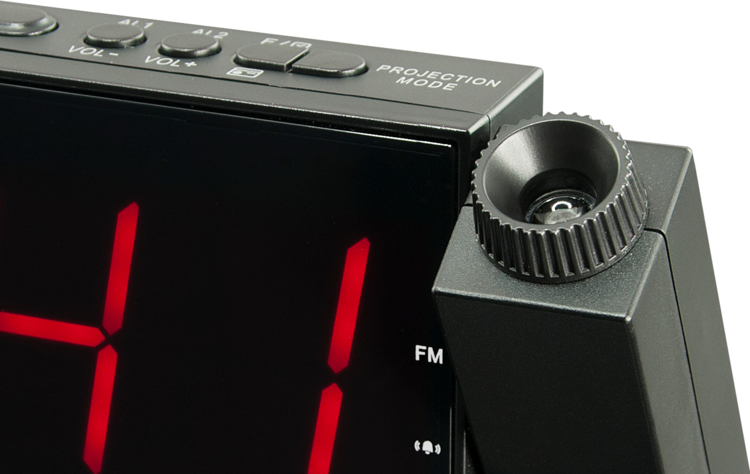 Close-up of a digital alarm clock with a projection mode and red numbers.
