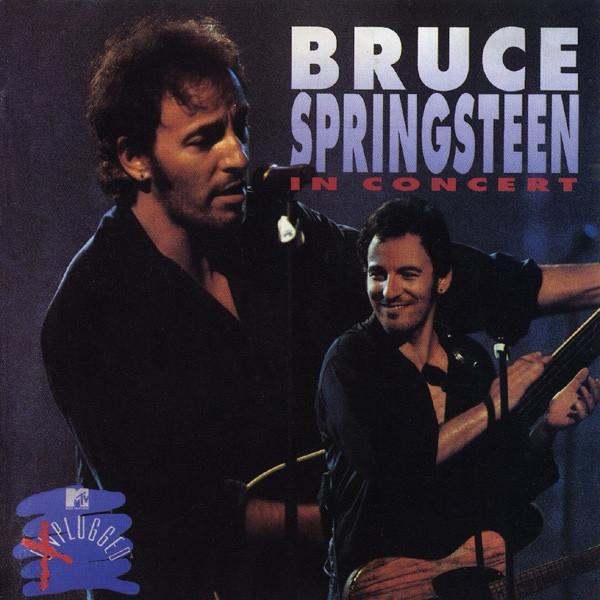 Albumcover Bruce Springsteen in Concert. Zwei Bilder von ihm, eins mit Mikrofon, eins mit Gitarre.