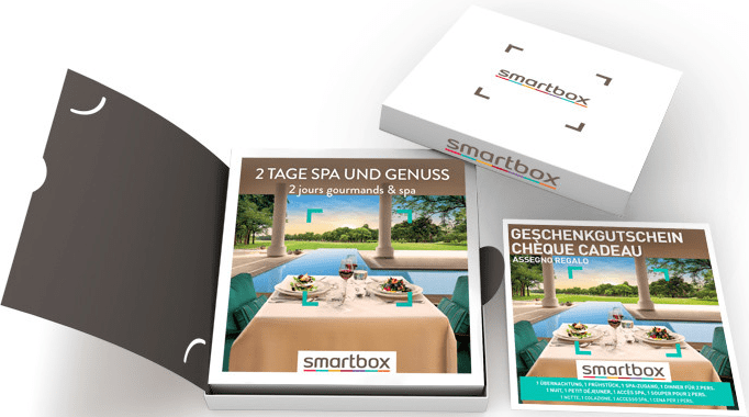 Confezione regalo Smartbox bianca, aperta con una carta che mostra una scena di ristorazione.