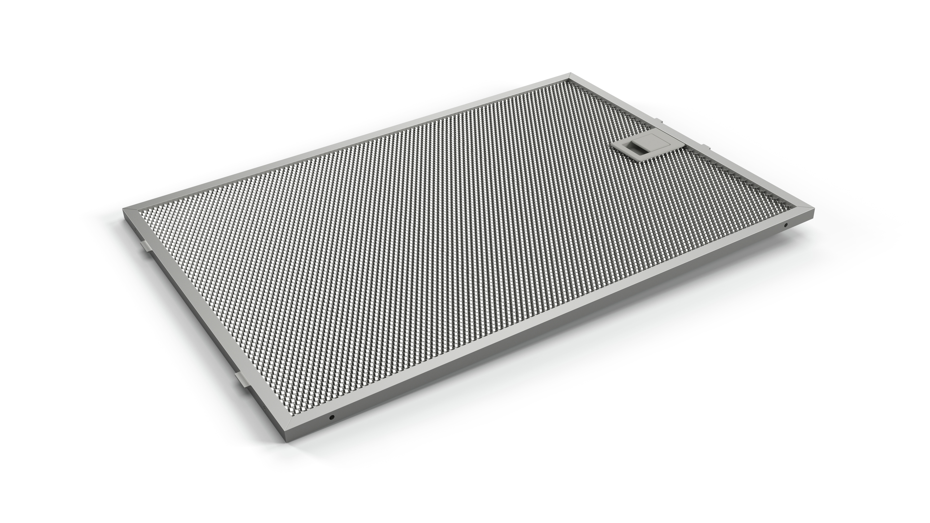 Un filtre de hotte argenté avec une grille à mailles fines. Le filtre est rectangulaire et propre.