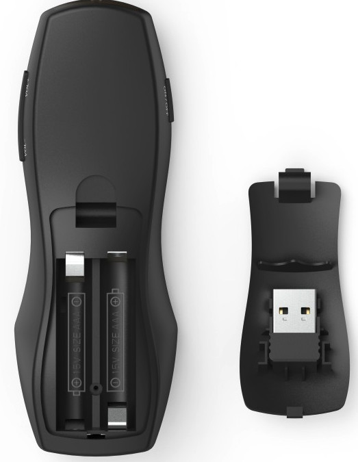 Télécommande noire, ouverte pour montrer le compartiment à piles et un récepteur USB.