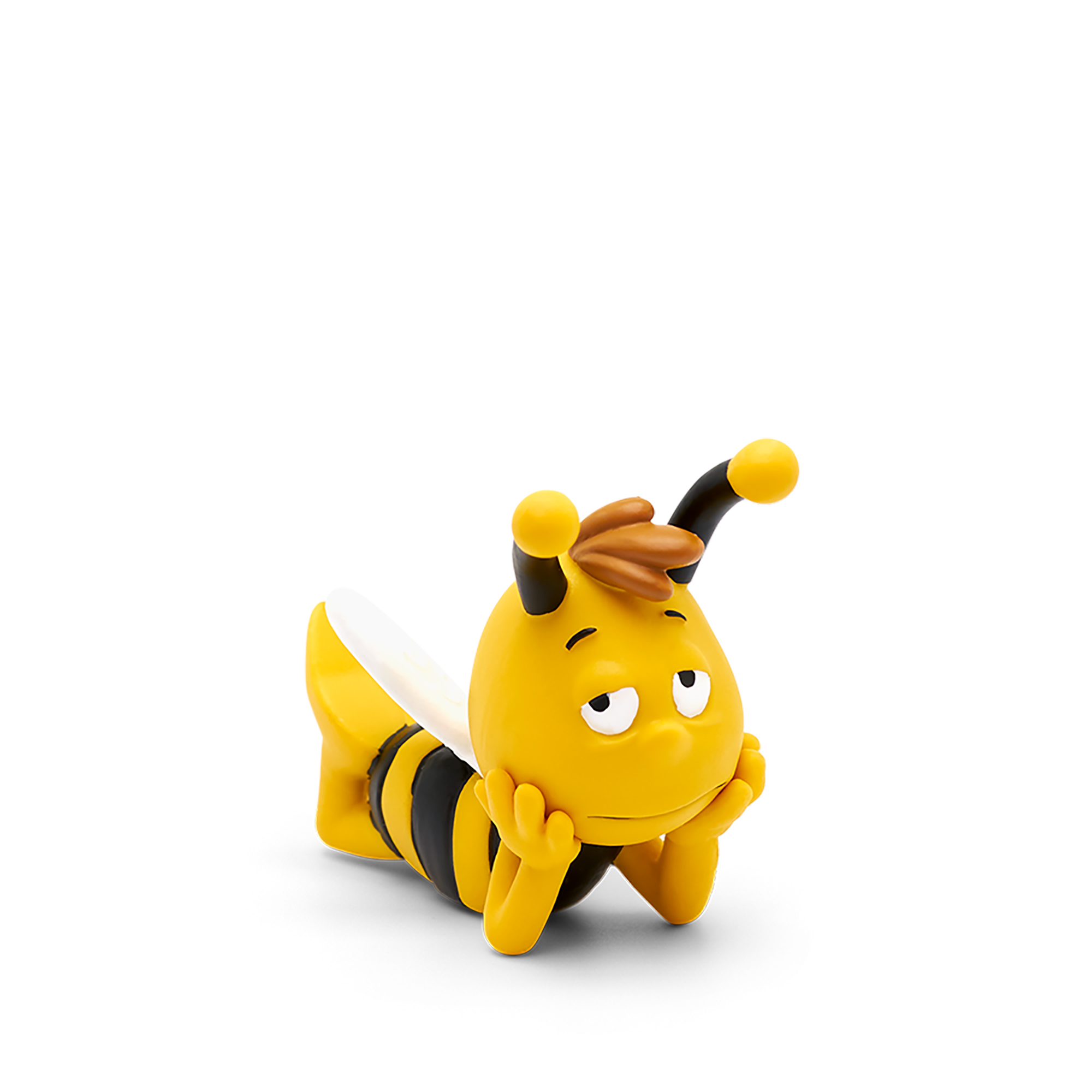 Gelbes Bienenspielzeug, das auf der Seite liegt und seinen Kopf mit den Händen abstützt.