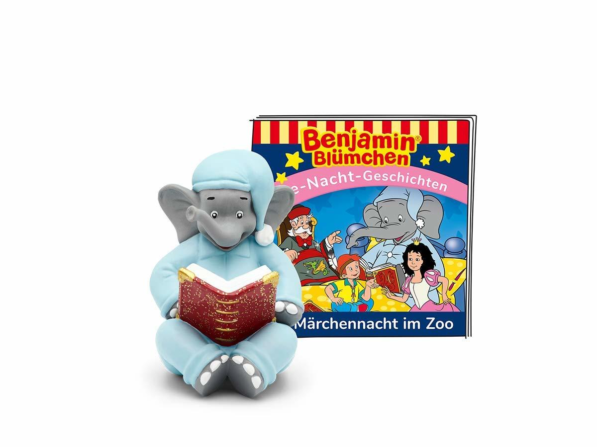 Spielzeug-Elefant im Pyjama liest ein Buch, neben einem Kinderbuchcover.