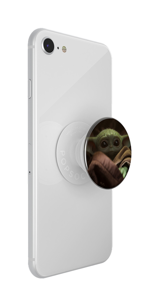 Eine Person hält ein weißes Popsocket an einem Telefon fest.