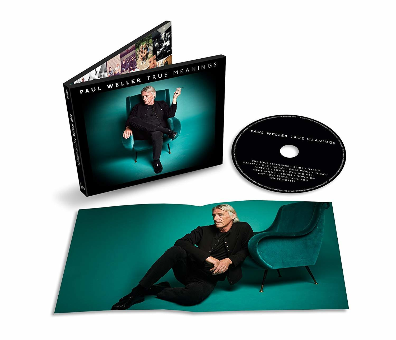Ein CD-Album mit Paul Weller. Paul Weller sitzt in einem Stuhl in einem dunklen Raum.