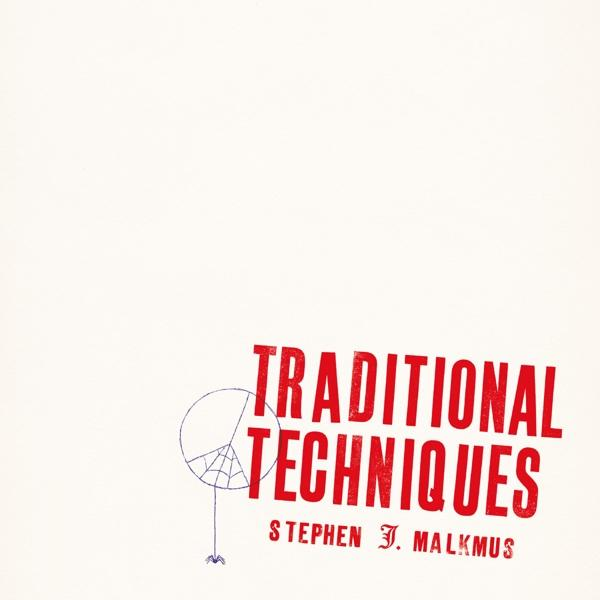 Couverture de livre avec texte rouge 'Traditional Techniques' et un diagramme de toile d'araignée sur fond blanc.